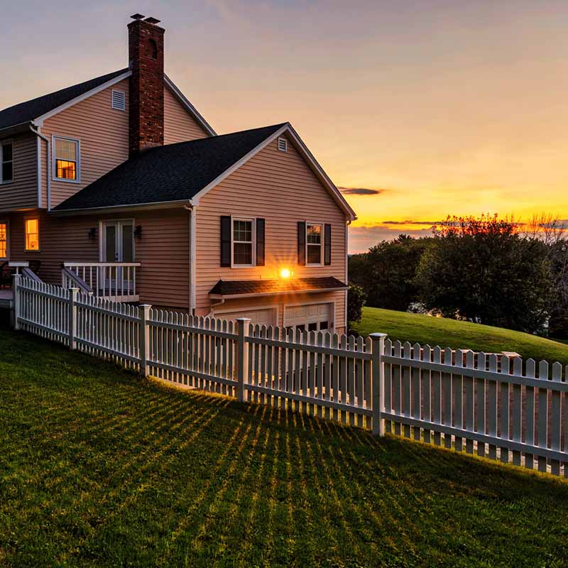 Beautiful colonial American house at sunset